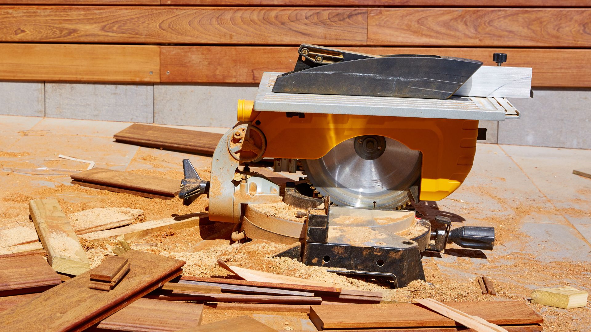 A table saw sits on a pile of wood